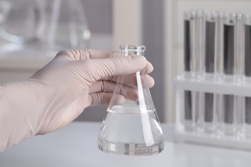conical flask of sustainable aviation fuel for testing
